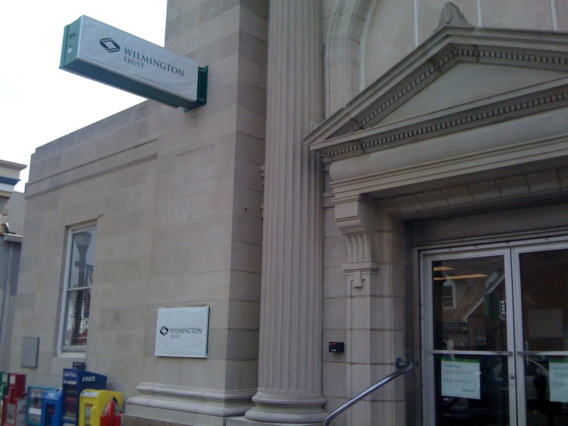 On Second Street in Lewes, the new M&T signs are in place beneath the temporary Wilmington Trust signs. BY DENNIS FORNEY