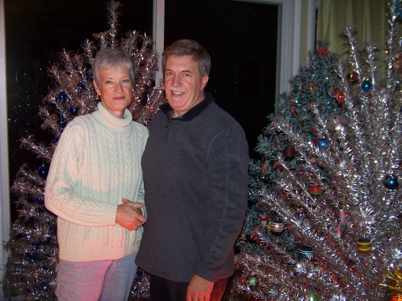 Kate and Bunky Markert in their grove of aluminum Christmas trees. BY RYAN MAVITY