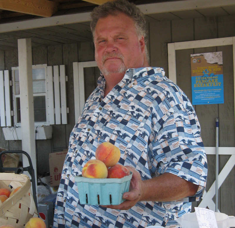 Tom Williams of Rehoboth Beach enjoys meeting old and new customers at his produce stand. BY RACHEL SWICK MAVITY