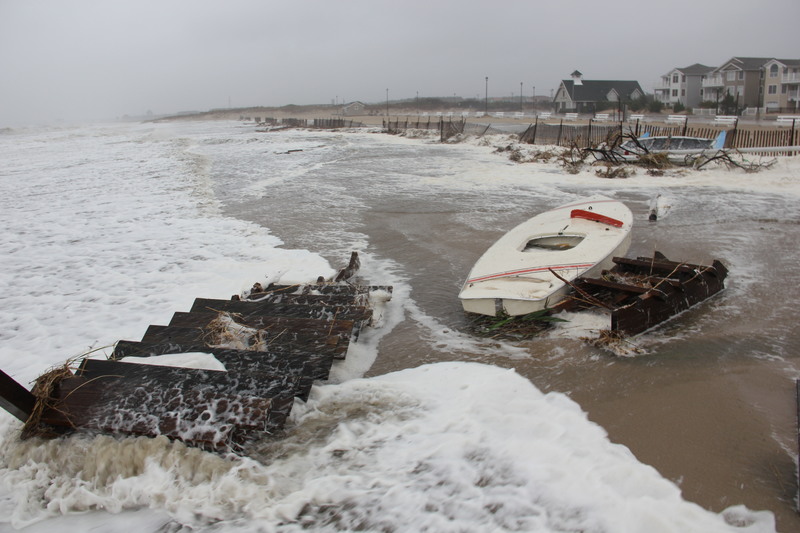 North, northwest wind was blowing plenty of waves down Delaware Bay - as well as some dune stairs and sunfish sailboats - and onto the public beach at Lewes. BY DENNIS FORNEY