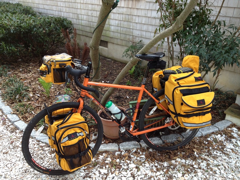 That's a pair of sandals between the two rear panniers. If the hills get too steep, I'll take off the biking shoes, strap on the sandals and start pushing uphill. I know I can push the bike at least two miles per hour. Coming down the other side will be easier and faster. Which state do you think has the total amount of climbing? Not the highest, but the most pedaling uphill? Answer: tomorrow. BY DENNIS FORNEY