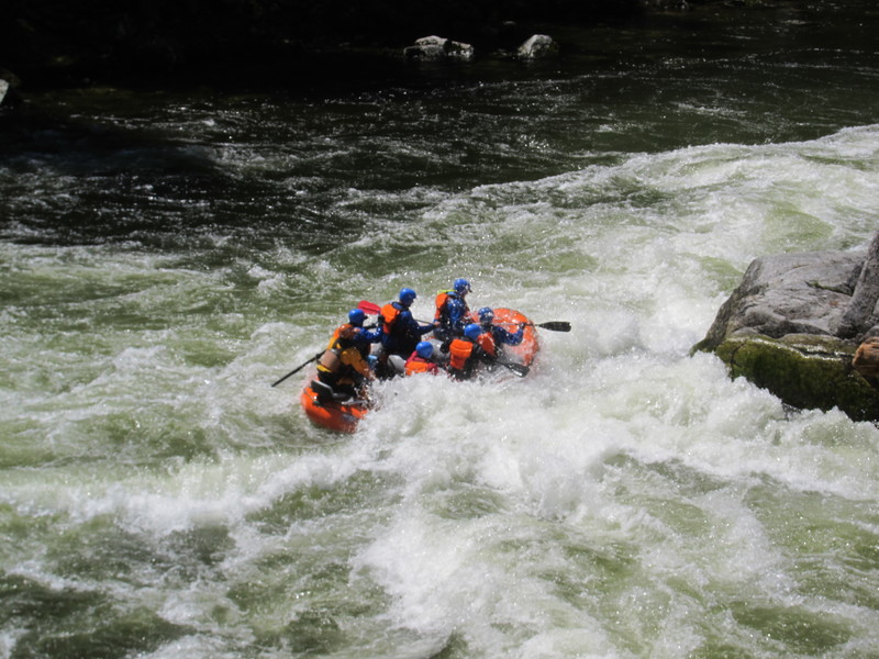 A group of rafters narrowly misses Castle Rock in the section of the Lochsa River known as The Set, for its succession of challenging rapids. On a sunny Saturday, the river was loaded with rafters and kayakers. BY DENNIS FORNEY