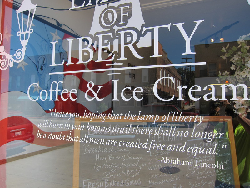 Here's the front window of Lamp of Liberty coffee shop. Read that quote carefully. It's pretty amazing. BY DENNIS FORNEY
