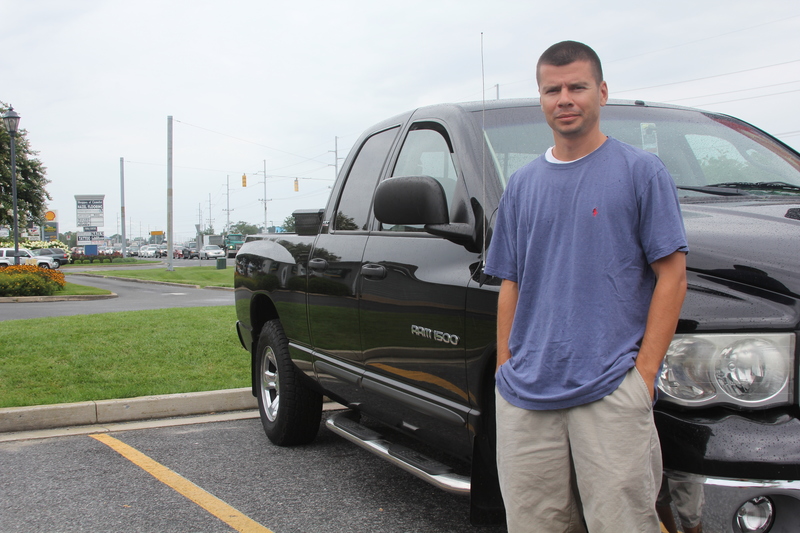Ricky Pennington stands near a Route 1 intersection where he came upon an attempted purse snatching at the end of July. BY MELISSA STEELE
