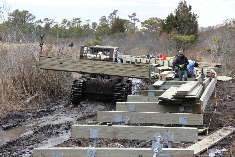 The boardwalk over the marsh represents a solid piece of construction designed to be minimally invasive in a sensitive and challenging environment. BY DENNIS FORNEY