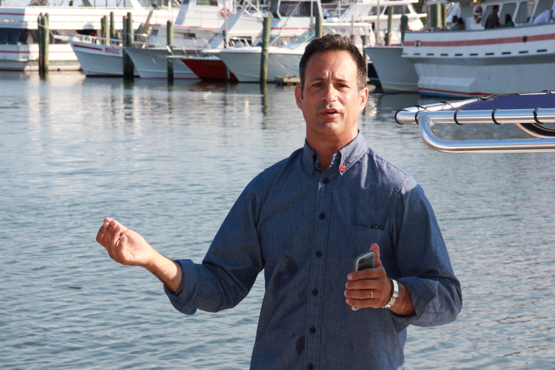 Sam and his nautical shirt on the waterfront in Lewes, as he readies to embark on his East Coast trip up to Dogfish Cove in Maine. BY DENNIS FORNEY