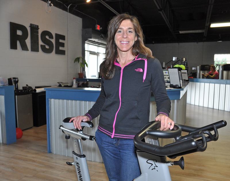 Spin instructor Elaine Dernoga recently surpassed the 1,000-class mark at RISE Fitness + Adventure in Lewes. BY NICK ROTH