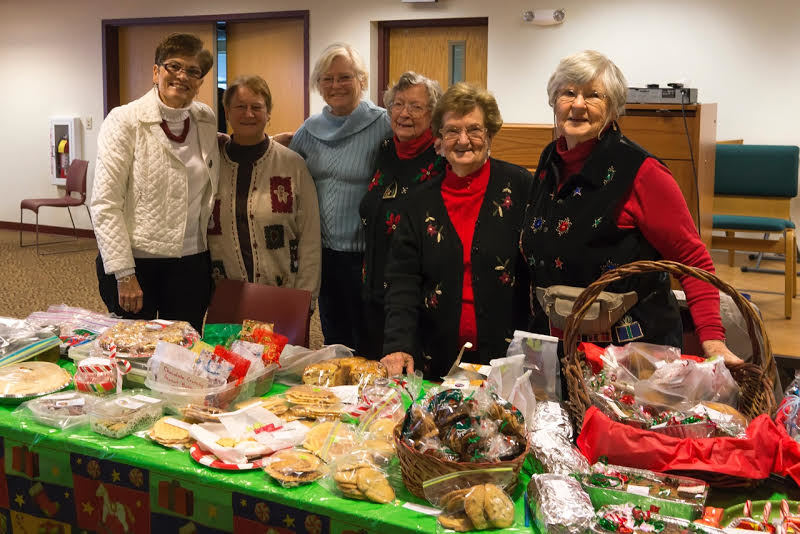 Members of the Kelly Class (l-r) Ruth Goarcke, Doris Burkhardt, Lyn Traxler, Norma Bame, Charlotte Burns, and Ginny Small offer baked goods at the 2013 Christmas Bazaar. SOURCE SUBMITTED