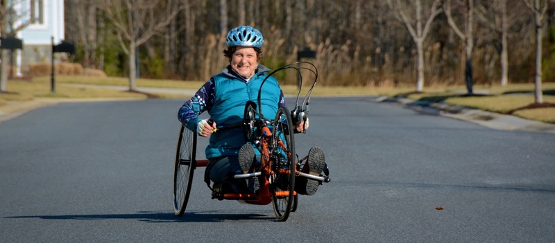 Jeanne Goldy-Sanitate goes on a training ride on her handcycle in her community near Rehoboth Beach. BY RON MACARTHUR