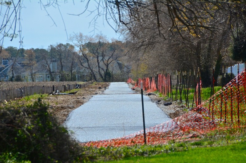 Work to extend the Junction and Breakwater Trail is underway along the border of the Showfield property. The extension will provide a link between Freeman Highway and Gills Neck Road. BY RON MACARTHUR