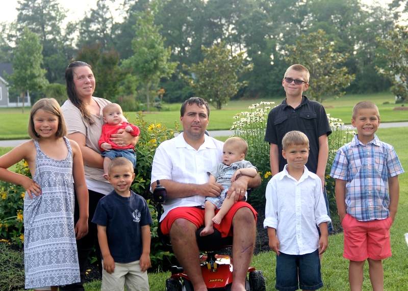 The Morgan family poses for a recent photo. Shown are (l-r) Erin, 8; Lisa; Liam, 4 months; Kyle, 4; Matt; Noah, 18 months; Michael, 11; Sean, 5; Ryan, 7. SOURCE SUBMITTED