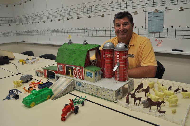 Fred Sposato is shown with a farm set like the one he got for Christmas in 1959. SOURCE SUBMITTED