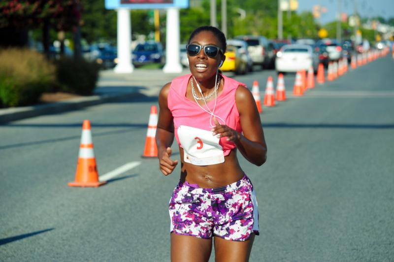 Tracey Duffy rocks the power of nice. Here she is finishing the Rehoboth Fire House 5K. DAVE FREDERICK PHOTO