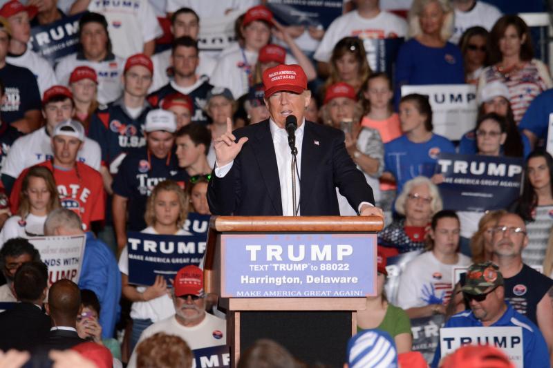Republican presidential candidate Donald Trump takes center stage at a rally at the Delaware State Fairgrounds in Harrington. BY RON MACARTHUR
