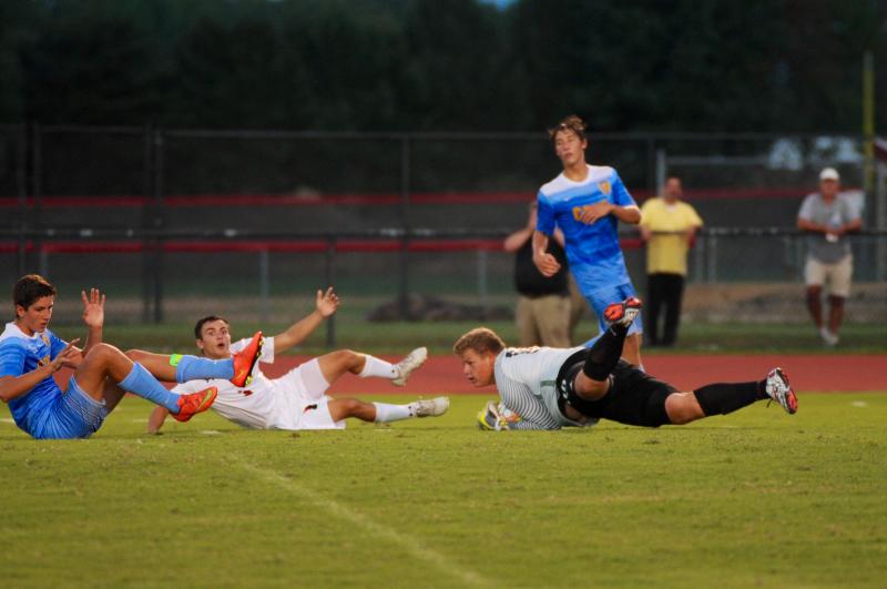 Wesley Lewis tilts the field stopping a second-half rush on goal. DAVE FREDERICK PHOTO