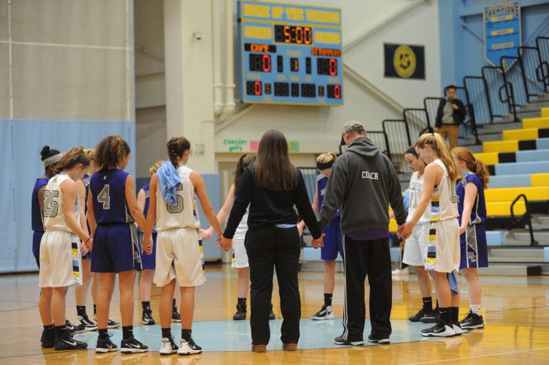 Delmarva Christian and Cape players capture something bigger than a 41-1 basketball game. DAVE FREDERICK PHOTO