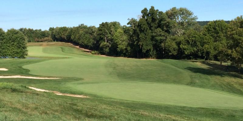The par 5 third hole at the Old Course at Stonewall, site of the 2016 U.S. Mid-Amateur Championship. The view is from the hillside above the back of the green, to the fairway and tee. FRITZ SCHRANCK PHOTO
