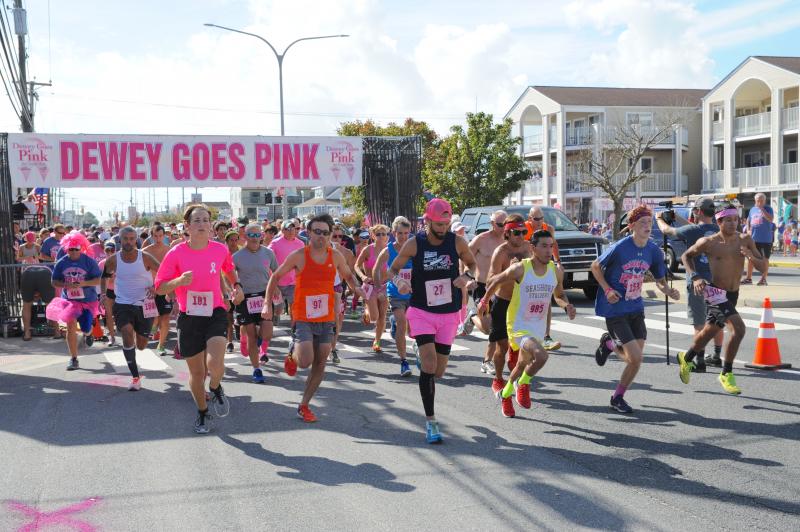 About 1,300 runners take off for the Dewey Goes Pink 5K. DAVE FREDERICK PHOTOS