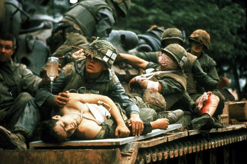 Stars and Stripes photographer John Olson captured this image, with A.B. Grantham in the foreground. The photograph became known as ‘The Marine on The Tank’ during the battle of Hue. The picture ran in Life magazine and other publications around the world. JOHN OLSON PHOTO