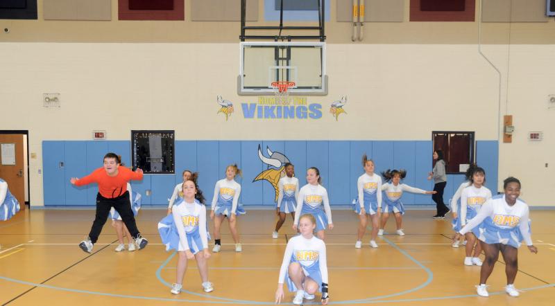 Davey Frederick joins Beacon’s basketball cheerleaders for a floor exercise. DAVE FREDERICK PHOTO
