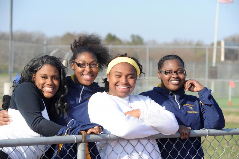 Along the fence are (l-r) Janay Cox, Ronikia Brittingham, Mackenzie Parker and Jonasia Woods. DAVE FREDERICK PHOTO