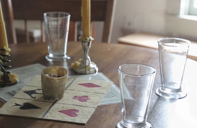 The tavern setting includes small round tables where folks may mingle, learn period games or read newspaper clippings from the era.