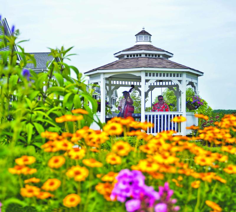 Local musicians Dr. Bob (upright bass) performs with keyboardist Jeff Irwin at The Moorings at Lewes during a previous Garden Tour. The weather forecast looks great for this year’s tour, set Saturday, June 16. DENY HOWETH PHOTO