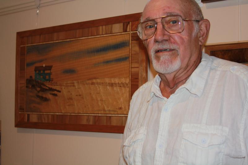 Milton artist Bob Weston creates designs with veneer. His depiction of Broadkill Beach recently sold to John Bridgeman. MELISSA STEELE PHOTO