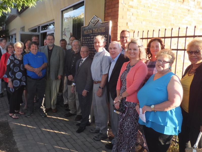 Milton town and theater officials pose in front of the historic marker. The theater began its Milton Theatre Renaissance Initiative, a $2.5 million capital campaign to purchase and restore the more than 100-year-old building. RYAN MAVITY PHOTOS