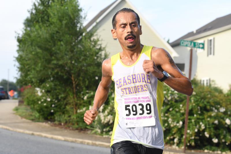 Martin Rodriguez, 36, wins the Dam Mill 5K in 17:28. Rodriguez won his age group for the Seashore Striders Summer Racing Series. DAVE FREDERICK PHOTO