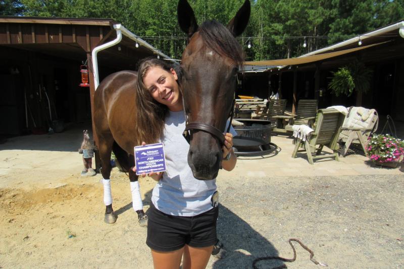 Macy Beach and her horse Chasing Moonlight celebrate their Junior Olympics showing this summer. MELISSA STEELE PHOTO