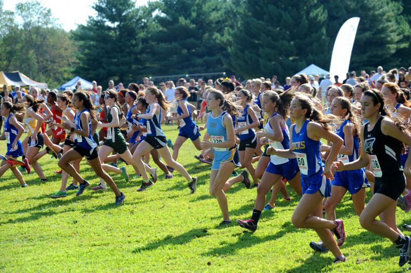The girls' varsity A race, which includes Cape and Sussex Tech, pushes through the heat wave at the start of the 2014 contest. DAVE FREDERICK PHOTO