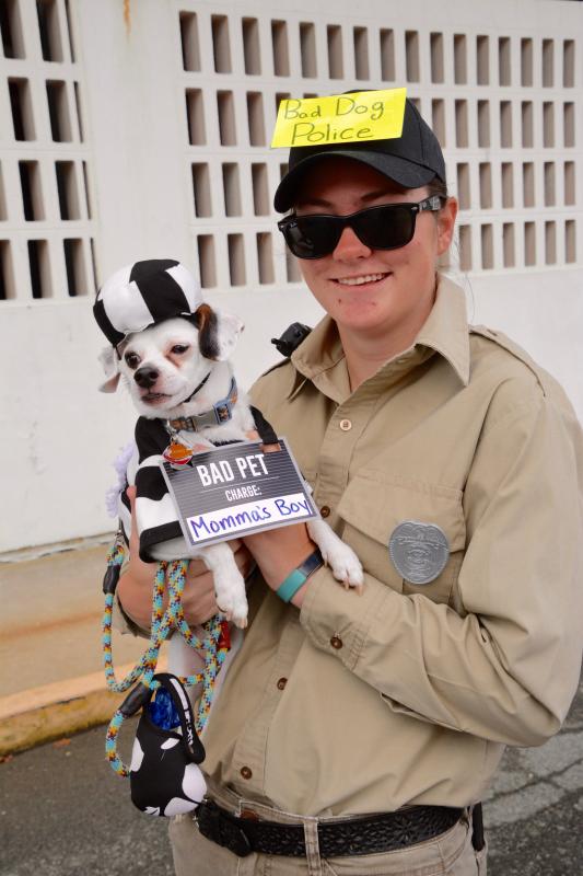 Ruthie Shutger of Harrisburg, Pa., holds Lewes, her bad dog, in custody. RON MACARTHUR PHOTO