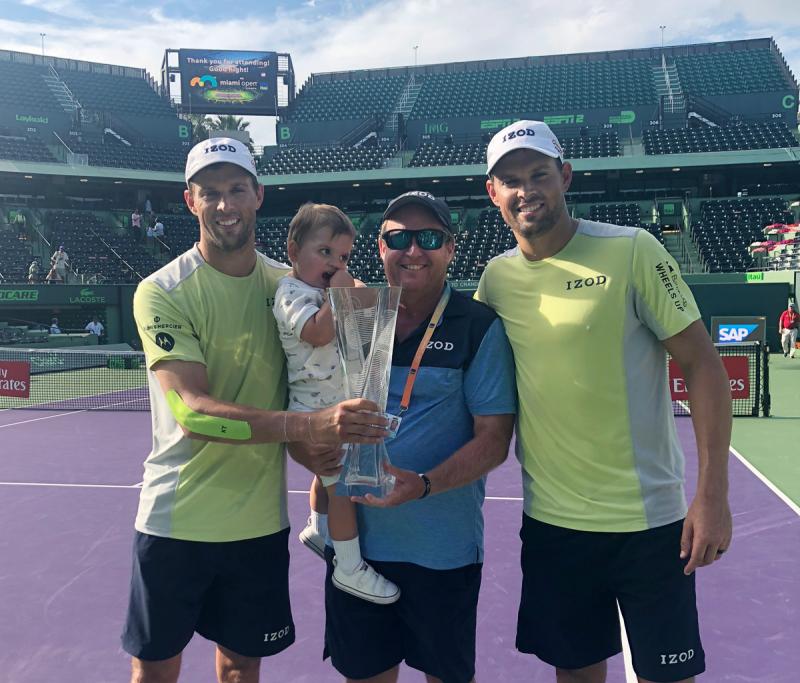 Dave Marshall, center, with the legendary Bryan brothers Bob and Mike. Dave is shown holding Bob’s son Richie. SUBMITTED PHOTO