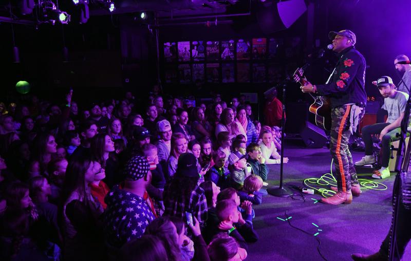 Jimmie Allen performs acoustically for the all-ages crowd.