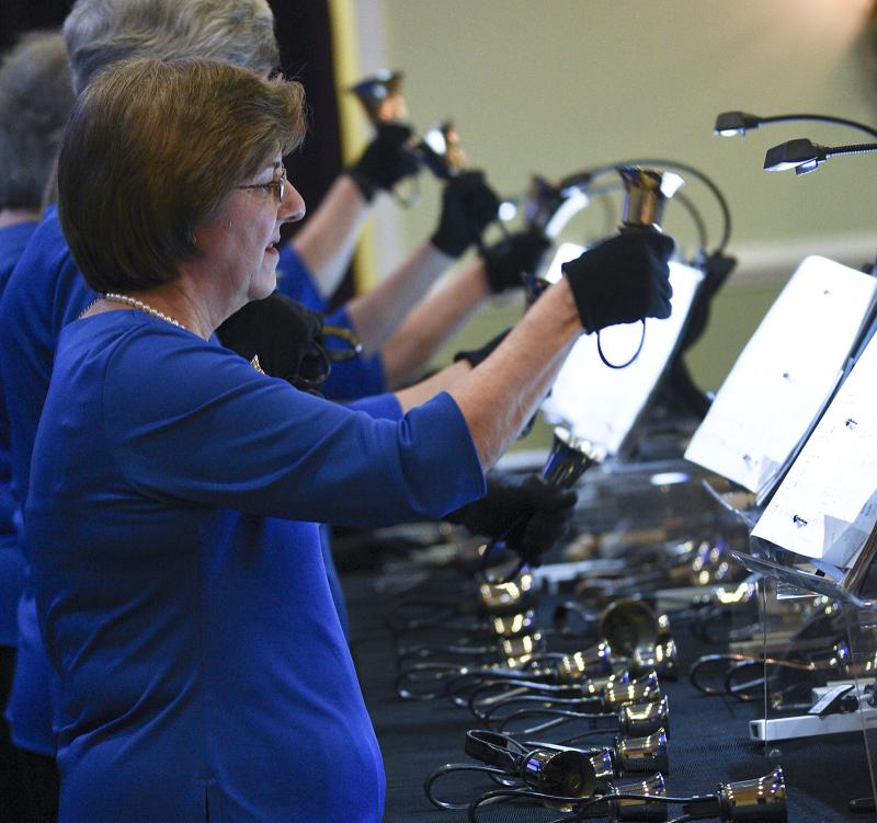Karen Jerolamon rings the smallest bell in the band.