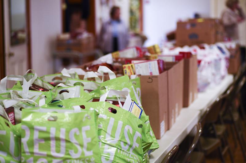 On Sunday, bags and boxes of dry items are prepped and ready for Monday morning.