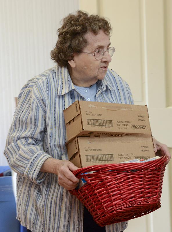 Elaine Brown does her part for the pantry.