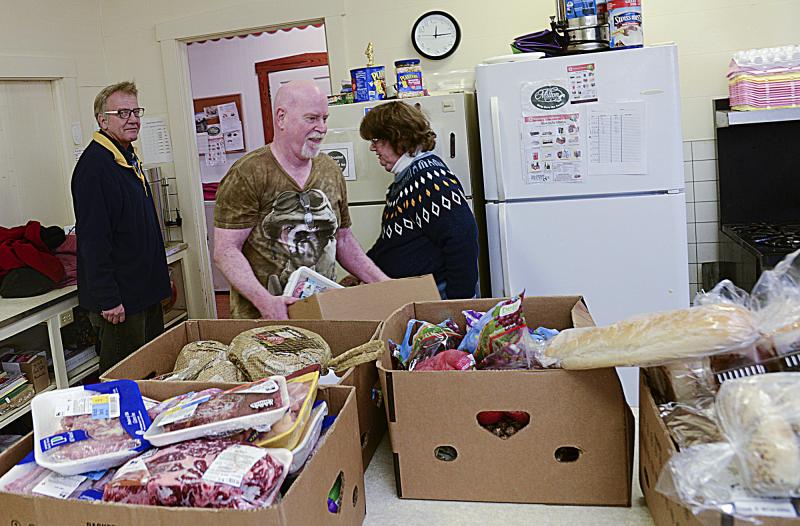 Frozen meats will be weighed, recorded and stored in the freezers.