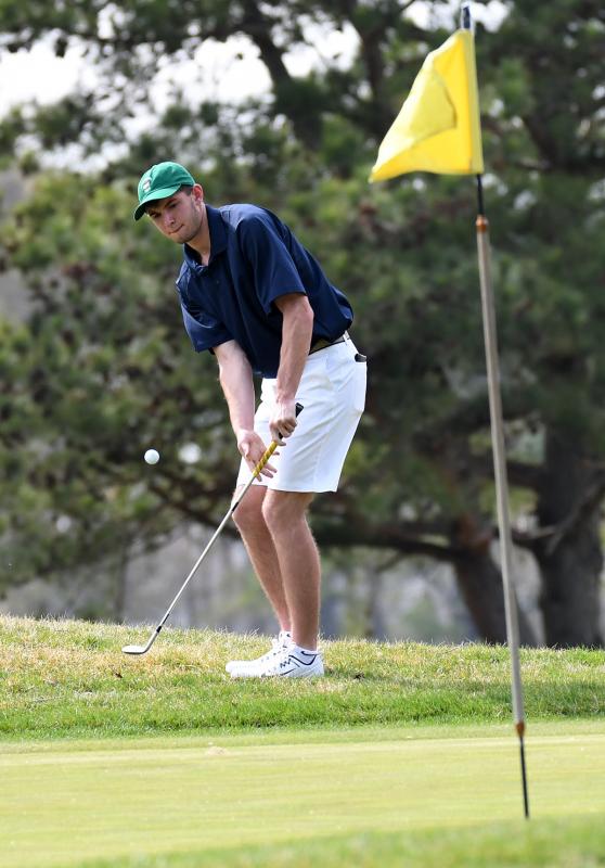 Cape’s Dane Palmer chips onto the green. He shot a 39.