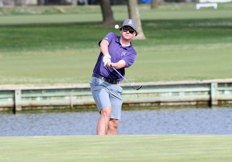 Sussex Academy sophomore Adison Browne chips to the green.