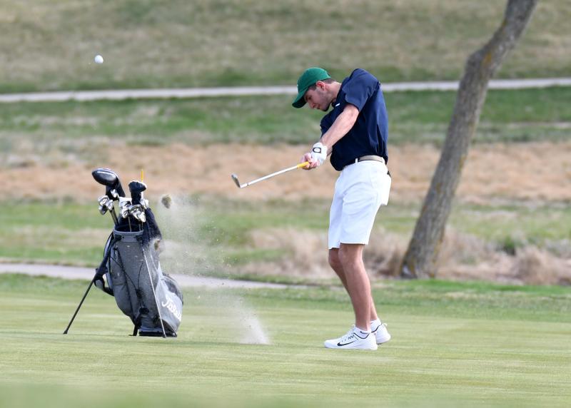 Cape senior Dane Palmer hits to the green.