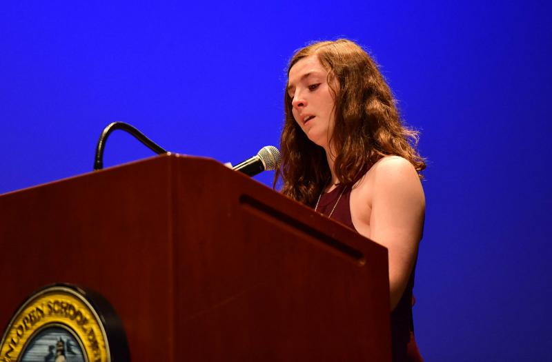 Vienna Iacona reads her speech during the senior services June 3.