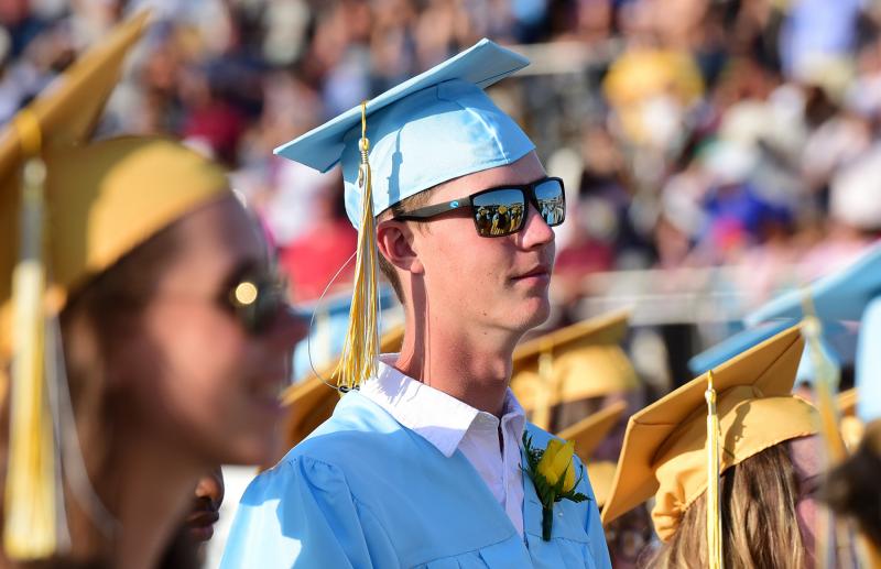 Parker Brown listens to Principal Nikki Miller.