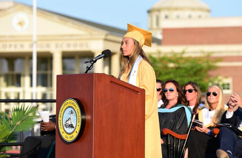 Class Valedictorian Maryann Tietbohl speaks to her classmates.