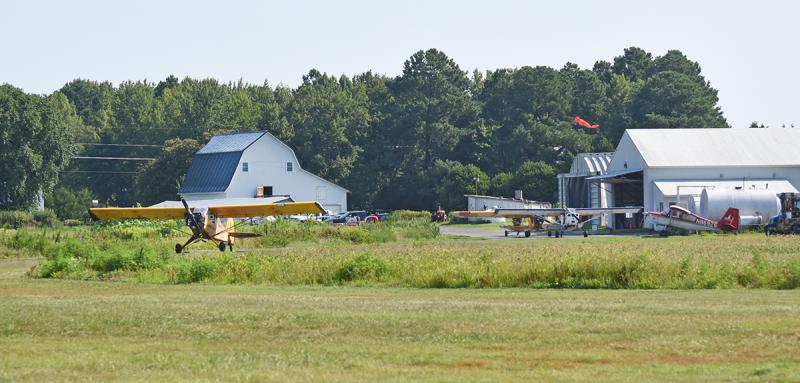 Pilots make their way out to the air strip to start the day.