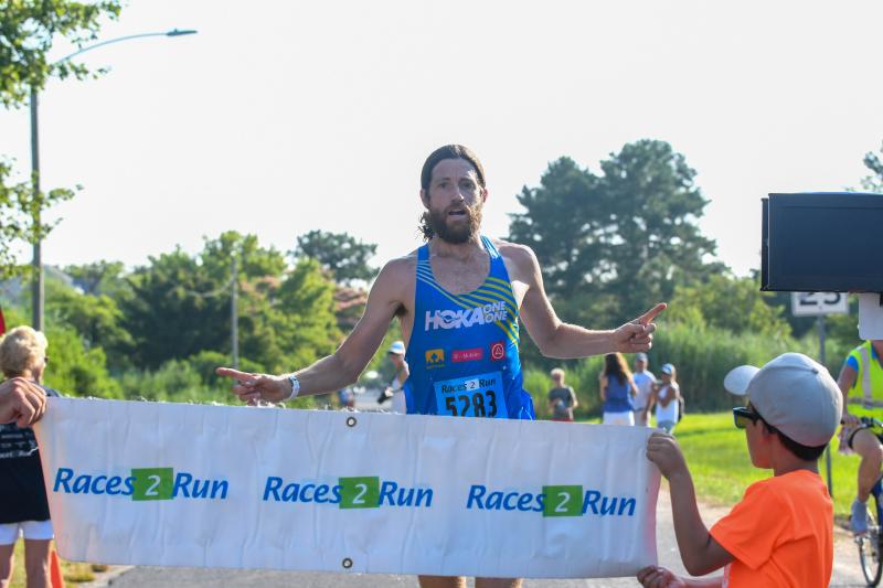 Michael Wardian, 45, of Arlington, Va., is the overall winner at the Kelly Fritchman 5K with a time of 16:48. Wardian is an ultra runner on the world stage. DAVE FREDERICK PHOTOS