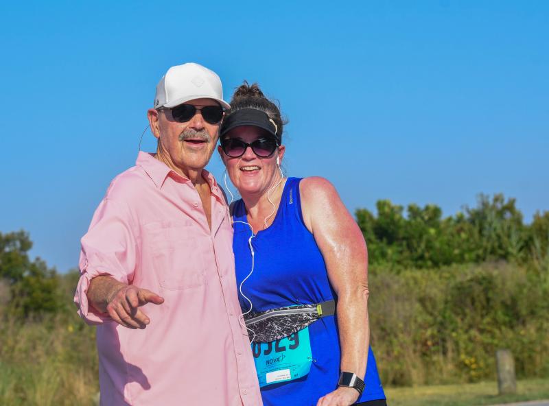 Coach George Glenn with his daughter Kelly at the Santa Sprint 5K. DAVE FREDERICK PHOTO
