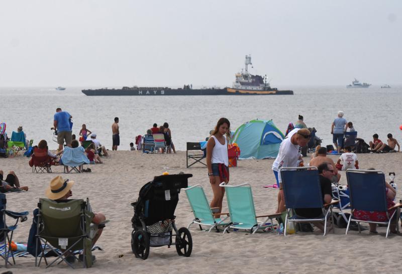 Folks arrived early to get a good spot in front of the barge.