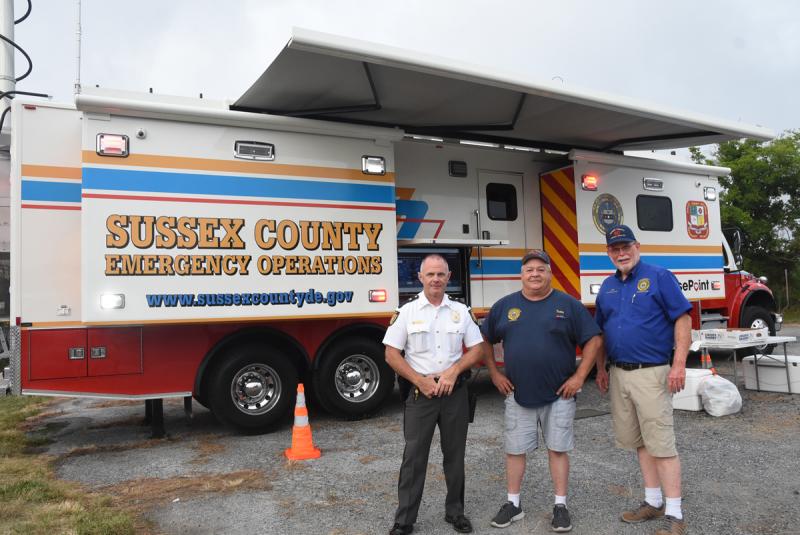 Standing outside Sussex County Emergency Operations Center are (l-r) Lewes Police Chief Tom Spell, Communication Specialist II Danny McBroom and 911 Technical Advisor Jim Bowden.